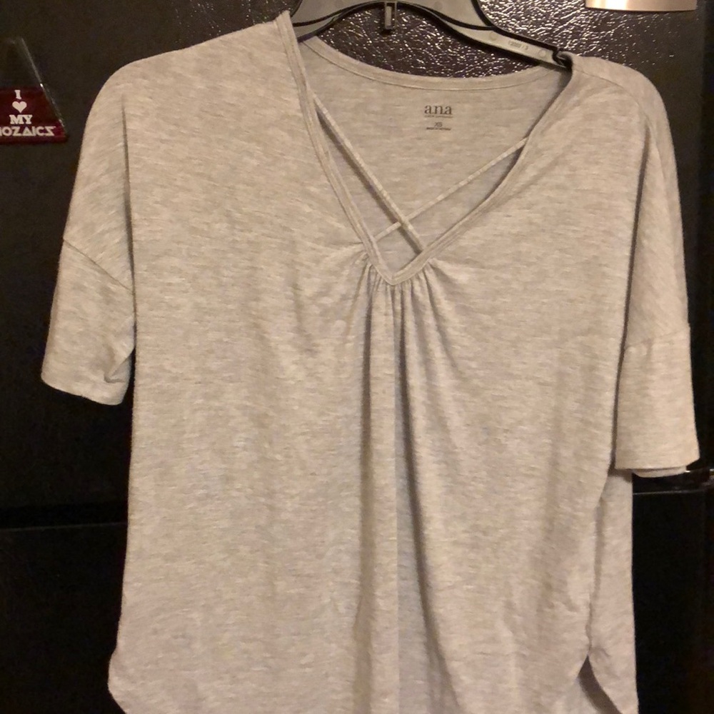Gray short sleeve shirt & front criss cross..EUC